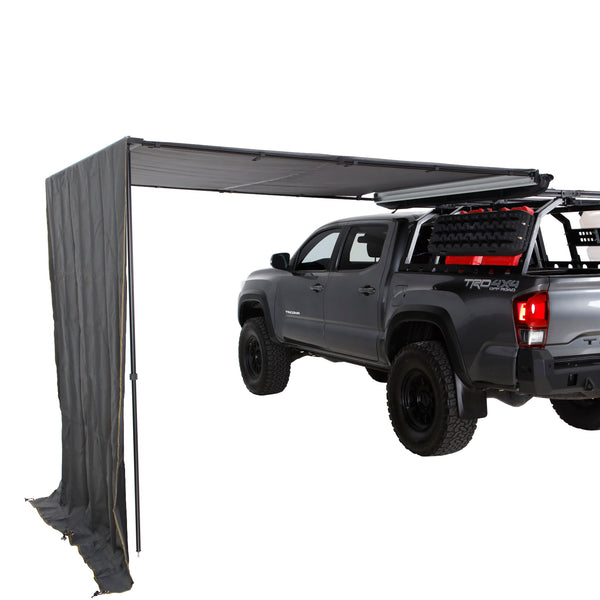 OVS HD Nomadic 90 Awning Shade Wall (6.5 ft) — Feature shot: side shade wall on a 90 awning on a pickup