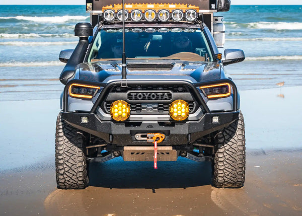 Backwoods Adventure Mods Hi-Lite Bull Bar (2016–2023 Tacoma) — Feature shot: bull bar bumper installed on a 3rd gen Tacoma front end
