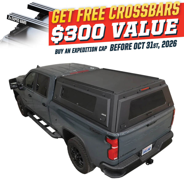 OVS Expedition PRO+ (2020–2027 Silverado/Sierra 2500 / 3500) — Feature shot: three-quarter view with optional OVS crossbars