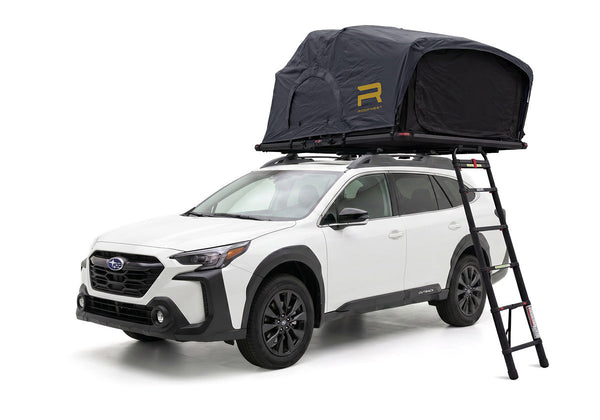 Roofnest Meadowlark 2 XL — Feature shot: open tent on a white Subaru Outback, front three-quarter view