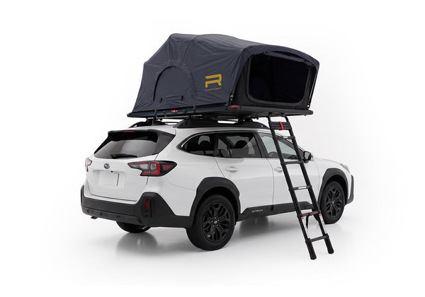 Roofnest Meadowlark 2 XL — Feature shot: open soft shell tent on a white Subaru Outback, rear view with ladder