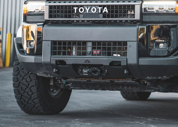Backwoods Adventure Mods Lo-Pro Hidden Winch Bumper (2024–2027 Land Cruiser 250) — Feature shot: hidden winch bumper installed on a Land Cruiser 250