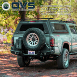 OVS Expedition PRO+ (2016–2023 Tacoma) — Lifestyle shot: cap in use outdoors, set up for hauling gear and camping trips