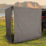 OVS HD Nomadic 90 Awning Shade Wall (6.5 ft) — Lifestyle shot: shade wall on a 90 awning at a mountain camp. Blocks low sun and wind for truck campers
