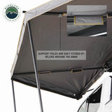 OVS HD Nomadic 180 LTE Awning — Feature shot: heat-sealed seams and support poles stowed along the rafters