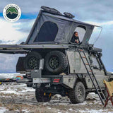 OVS HD Sidewinder — Lifestyle shot: tent open on an expedition truck in the snow
