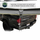 OVS HD Nomadic 270 Awning & 3-Wall Kit Combo — Feature shot: tie-down points that anchor the poles and shed rainwater