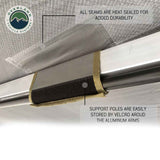 OVS HD Nomadic 270 Awning & 3-Wall Kit Combo — Feature shot: heat-sealed seams and support poles stowed along the rafters