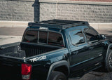 Backwoods Adventure Mods DRIFTR Roof Rack (2005–2023 Tacoma) — Feature shot: rack on a black Tacoma pickup