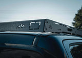 Backwoods Adventure Mods DRIFTR Roof Rack (2005–2023 Tacoma) — Feature shot: rear fairing close-up