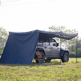 NaturNest Side Tent for 270 Car Awning Plus — Feature shot: full side panel deployed alongside the awning