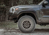 Backwoods Adventure Mods Hi-Lite No Bull Bar (2016–2023 Tacoma) — Feature shot: side view showing the cut-back high-clearance corners