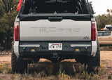 Backwoods Adventure Mods Rear Bumper (2022–2027 Tundra) — Lifestyle shot: white Tundra with the rear bumper