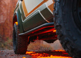 Backwoods Adventure Mods Rock Sliders (2022–2025 Tundra) — Feature shot: underside of the slider and frame mounts