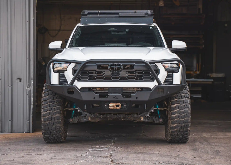 Backwoods Adventure Mods Hi-Lite Bull Bar (2024–2027 Tacoma) — Feature shot: bull bar bumper installed on a 4th gen Tacoma
