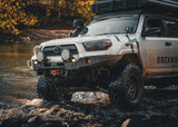 Backwoods Adventure Mods Hi-Lite No Bull Bar (2010–2024 4Runner) — Lifestyle shot: white 4Runner with a winch crossing water on the trail