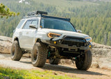 Backwoods Adventure Mods Hi-Lite Prerunner (2010–2024 4Runner) — Lifestyle shot: white overland 4Runner build with the prerunner bumper
