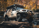 Backwoods Adventure Mods Hi-Lite No Bull Bar (2010–2024 4Runner) — Lifestyle shot: rock crawling with the Hi-Lite bumper