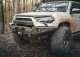 Backwoods Adventure Mods Hi-Lite No Bull Bar (2010–2024 4Runner) — Lifestyle shot: white 4Runner working the trail with the winch bumper