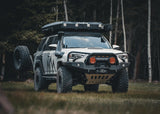Backwoods Adventure Mods Hi-Lite Bull Bar (2010–2024 4Runner) — Feature shot: bull bar winch bumper fitted with amber LED pod lights