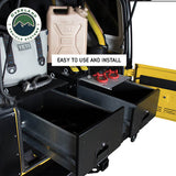 OVS Cargo Box with Slide-Out Drawer & Work Station — Lifestyle shot: installed and in use; a camp kitchen or organized cargo area ready at the tailgate.