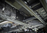 Backwoods Adventure Mods Rock Sliders (2024–2027 Tacoma) — Feature shot: frame mount plate under the body