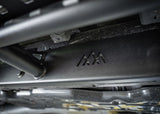 Backwoods Adventure Mods Rock Sliders (2024–2027 Tacoma) — Feature shot: frame mount plate with the Backwoods Adventure Mods logo