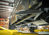 Backwoods Adventure Mods Rock Sliders (2024–2027 Tacoma) — Feature shot: underside view of the installed slider