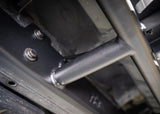 Backwoods Adventure Mods Rock Sliders (2024–2027 Tacoma) — Feature shot: welded tube-to-mount joint up close