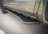Backwoods Adventure Mods Rock Sliders (2024–2027 Tacoma) — Feature shot: rear kickout ahead of the rear tire