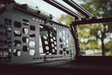 HeadBANGER — Lifestyle shot: close angle on the installed guard panel through the truck's rear window opening.