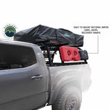 OVS Discovery Bed Rack – Mid-Size Truck Short Bed — Feature shot: recovery boards and fuel can on the MOLLE side plates