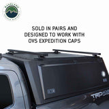 OVS Expedition Truck Cap Crossbars – 72 in — Lifestyle shot: pair installed on an Expedition truck cap; gear carried on the cap roof for weekend trips.