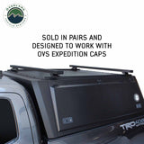OVS Expedition Crossbars 55 in — Feature shot: crossbars installed on an Expedition cap on a pickup