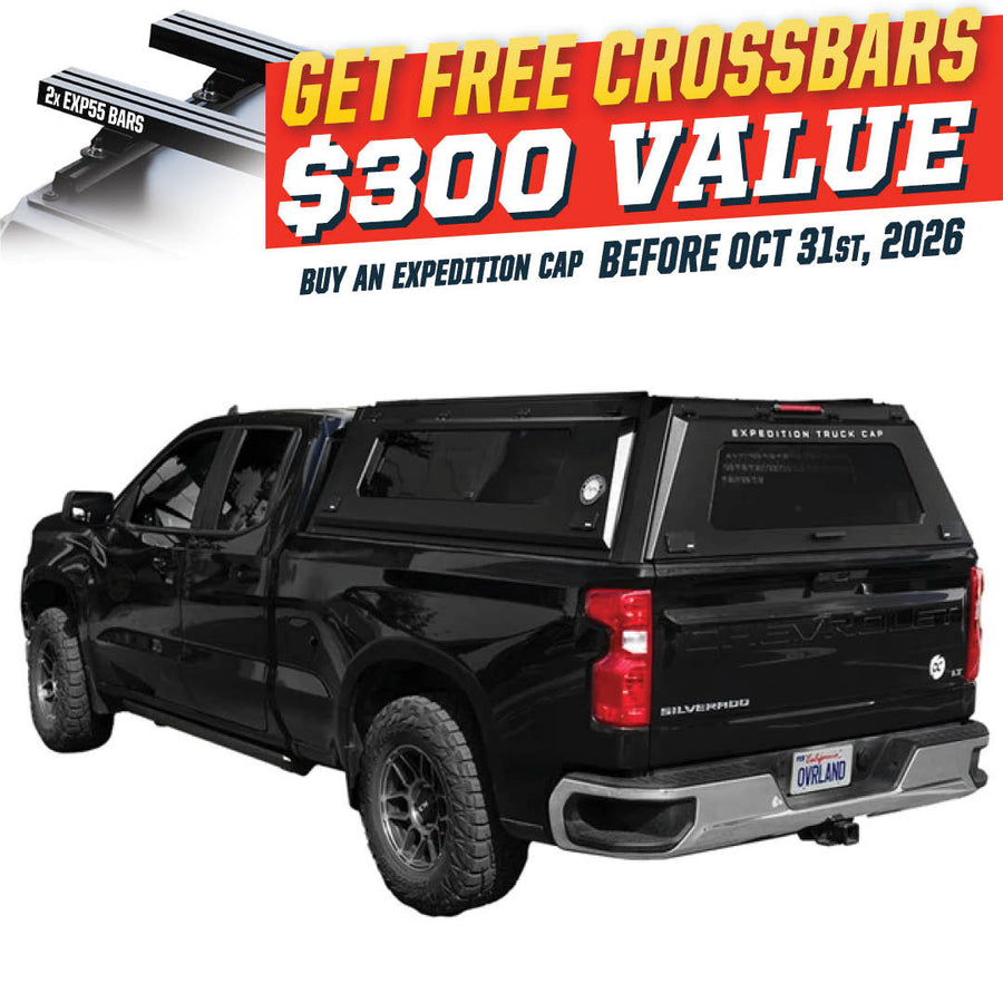 OVS Expedition PRO+ (2019–2027 Silverado/Sierra 1500) — Feature shot: three-quarter view with optional OVS crossbars