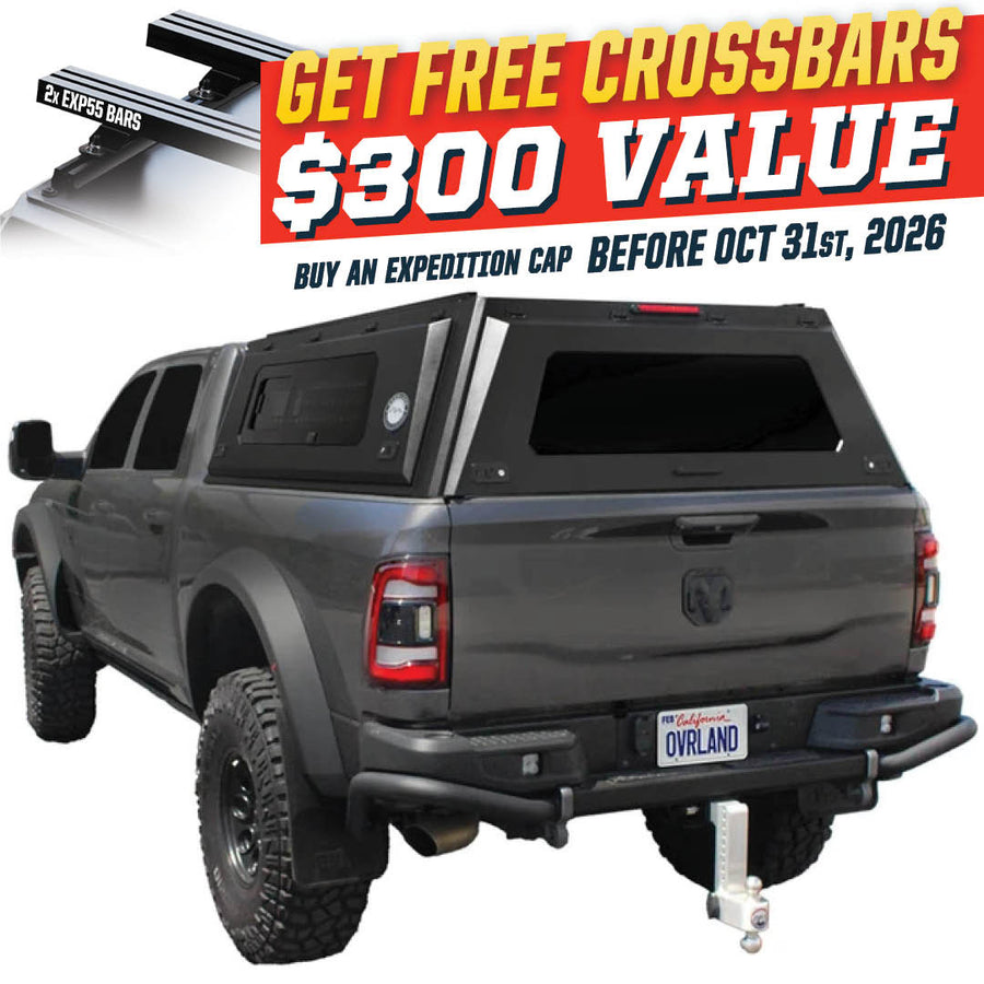 OVS Expedition PRO+ (2009–2027 RAM 2500/3500) — Feature shot: three-quarter view with optional OVS crossbars