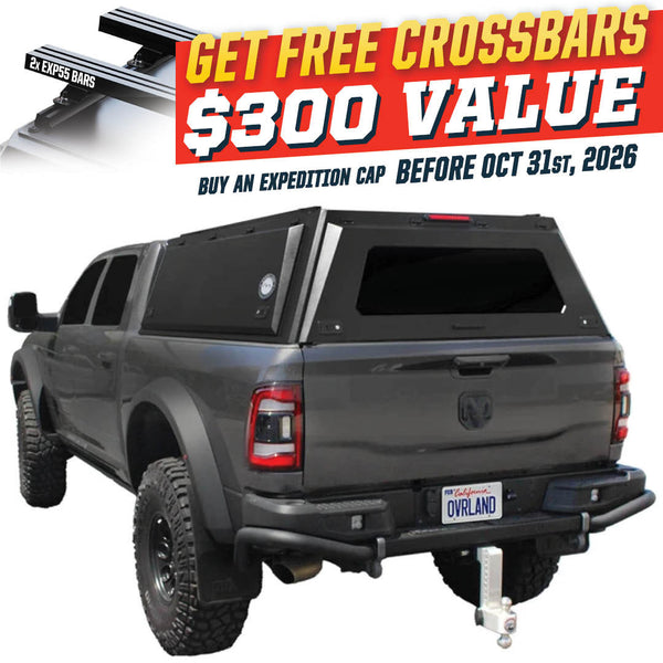 OVS Expedition PRO (2009–2027 RAM 2500/3500) — Feature shot: three-quarter view with optional OVS crossbars