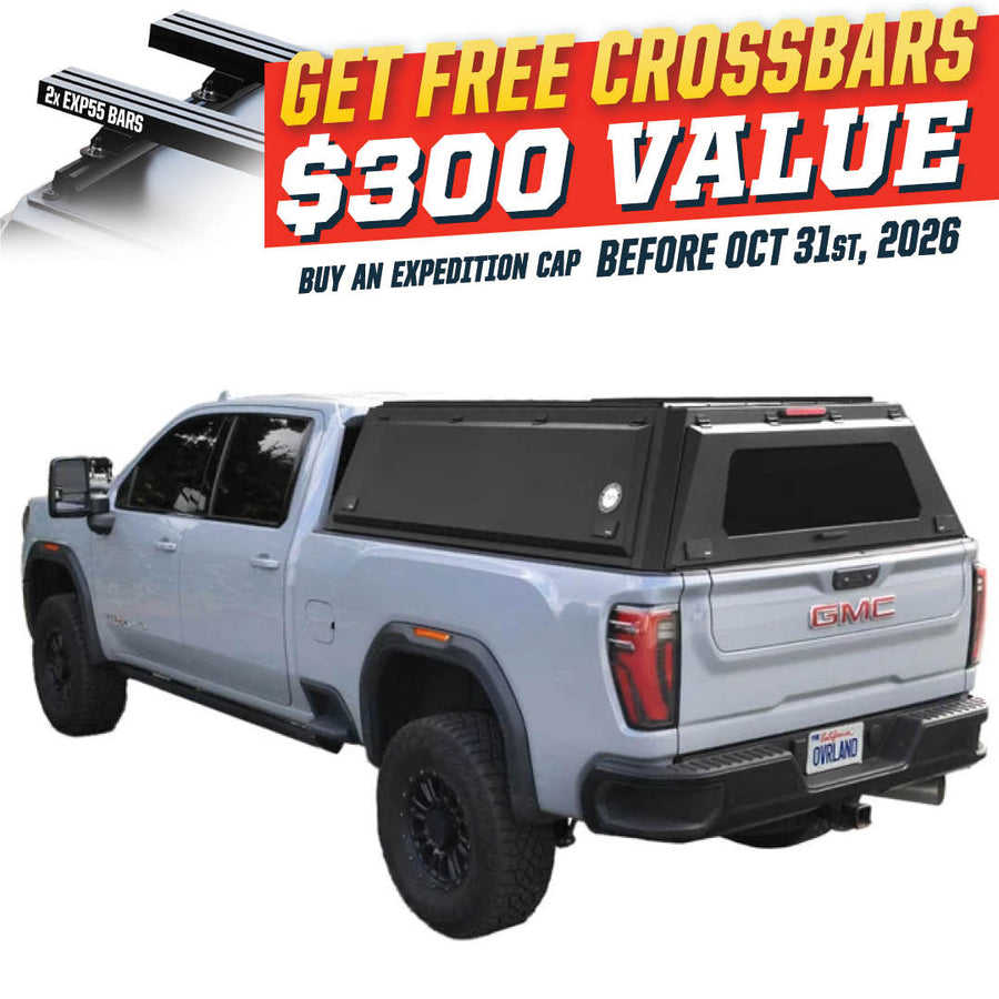 OVS Expedition PRO (2020–2027 Silverado/Sierra 2500 / 3500) — Feature shot: three-quarter view with optional OVS crossbars