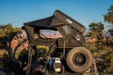 FSR Kali — Lifestyle shot: deployed on a Toyota Tacoma bed rack at a desert campsite