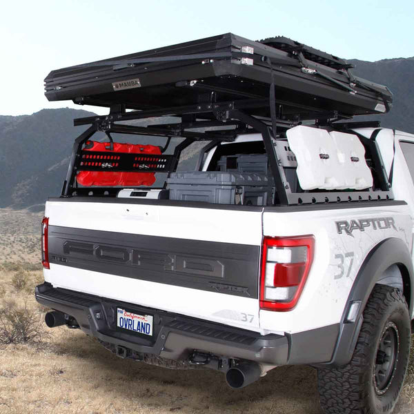 OVS Discovery Bed Rack – Full-Size Truck Short Bed — Lifestyle shot: installed and in use; rooftop tent, awning and recovery gear carried above the bed for multi-day trips.