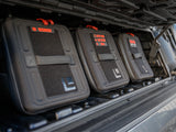 GearBAG G2 3-Pack — Lifestyle shot: three GearBAGs labeled Recovery, Air Up/Down, Tire Repair, Tools and First Aid, mounted together in the GearPOD XL.