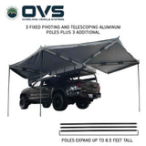 OVS HD Nomadic 270 Awning — Feature shot: deployed on a pickup with the pivoting telescoping aluminum support poles