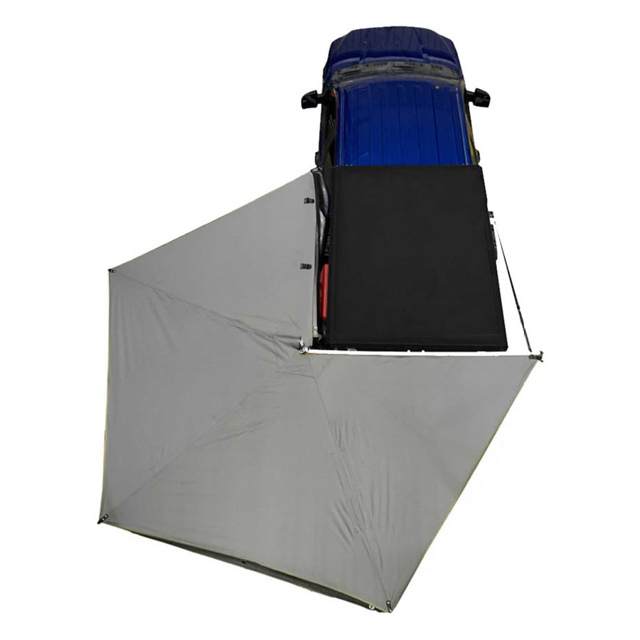 OVS HD Nomadic 270 LT Awning — Feature shot: overhead view on a pickup with the travel cover