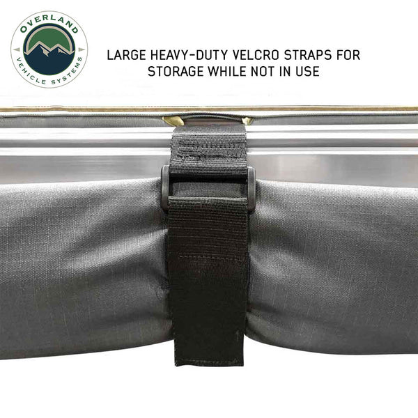 OVS HD Nomadic 90 Awning — Feature shot: heavy-duty hook-and-loop straps that hold the folded awning closed