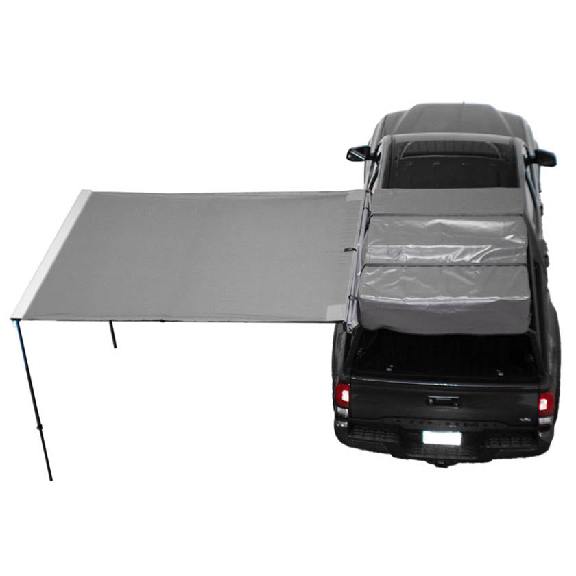 OVS HD Nomadic 90 Awning — Feature shot: deployed along the side of a pickup