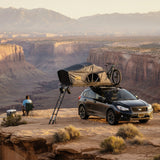 Roofnest Meadowlark — Lifestyle shot: open tent with rainfly on a Crosstrek at a desert canyon overlook. A light, simple setup for solo trips or couples.