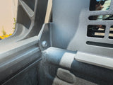 HeadBANGER — Feature shot: close-up of a mounting bracket and bolt securing the guard to the bed rack's rear leg.