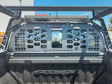 HeadBANGER — Lifestyle shot: straight-down bed view of a GMC AT4X showing the guard spanning the cab opening under the rack's top rail.