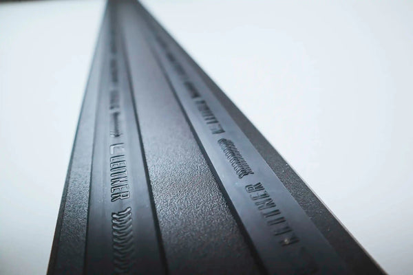 Abrasion Guard — Feature shot: close-up of TPR strip cross-section and T-channel profile