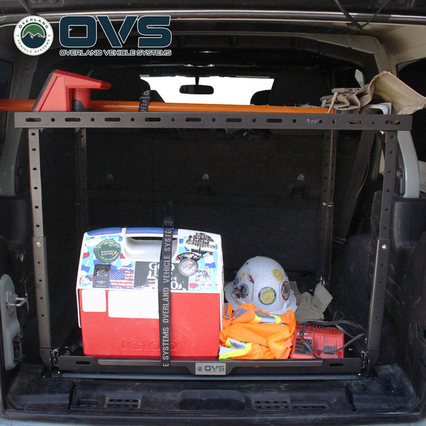 OVS Cargo Storage Rack with Sliding Tray – Jeep JL & SUVs — Lifestyle shot: installed and in use; a camp kitchen or organized cargo area ready at the tailgate.